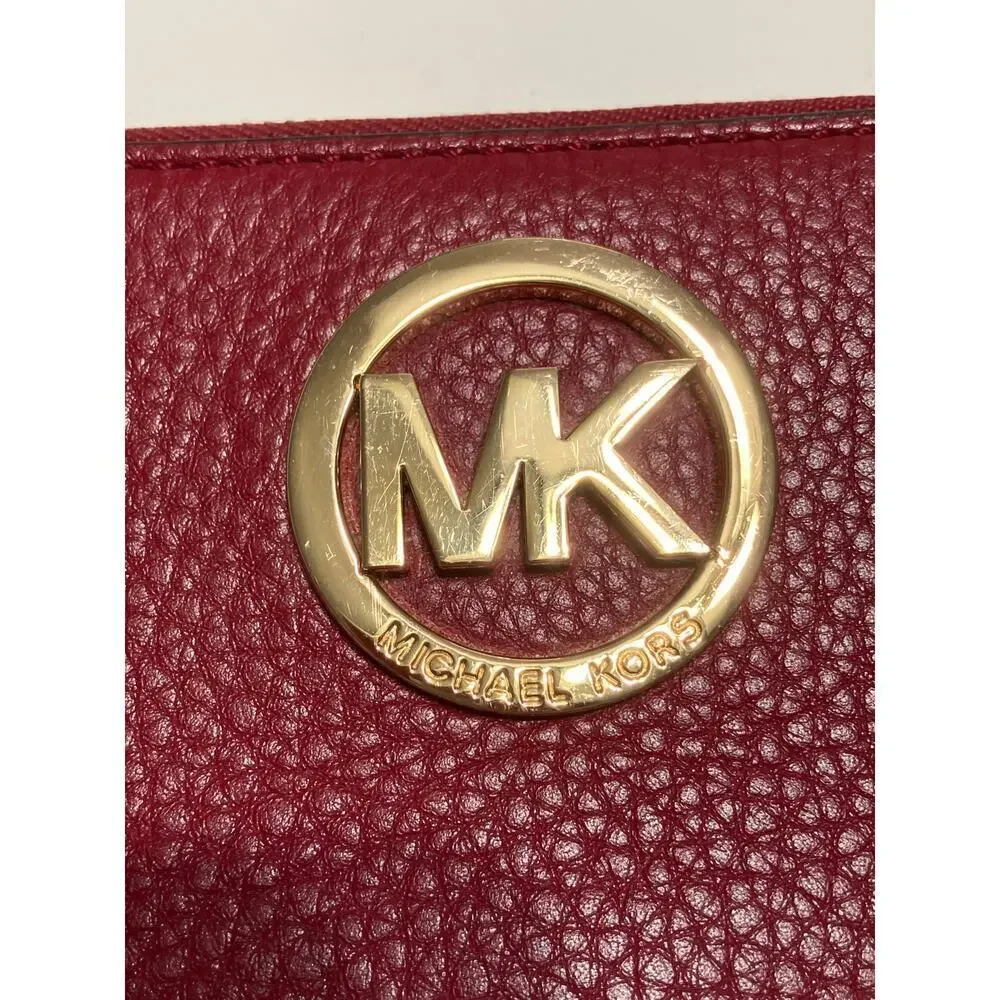 MICHAEL KORS, LARGE RED PEBBLED LEATHER WALLET